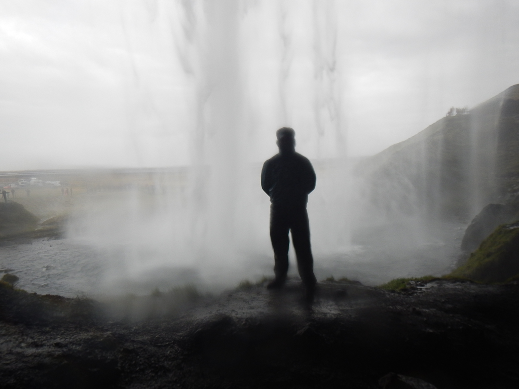 Chris behind the Seljalandsfoss waterfall